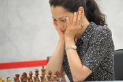 «Я играю за Россию с гордостью». Очень странный уход нашей чемпионки мира по шахматам