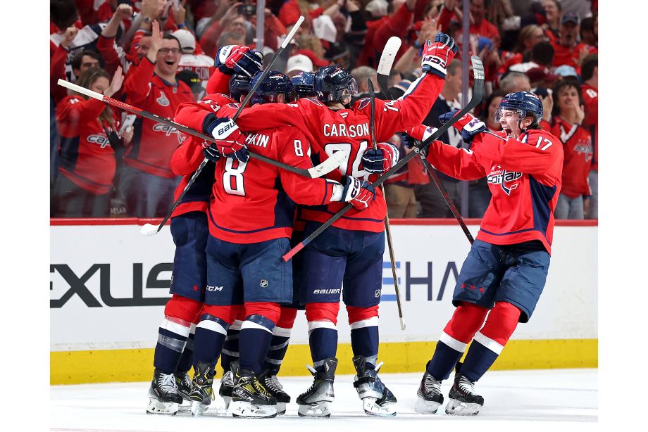 Джон Карлсон с партнёрами по «Вашингтону»