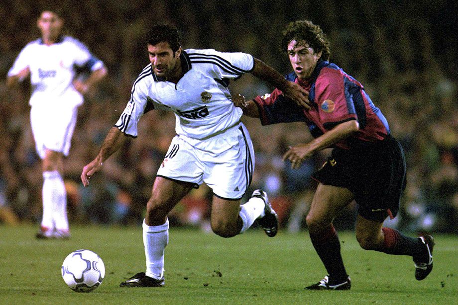 Luis Figo (izquierda) y Carles Puyol