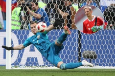 Игорь Акинфеев и Гинтарас Стауче
